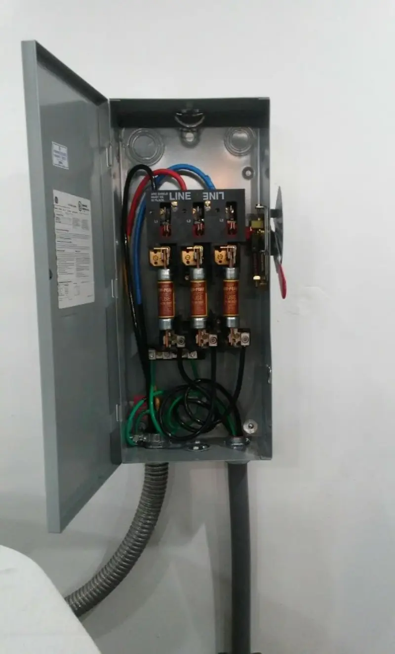 Three-phase disconnect switch installed for Smoke Detector Installation in Wellsville